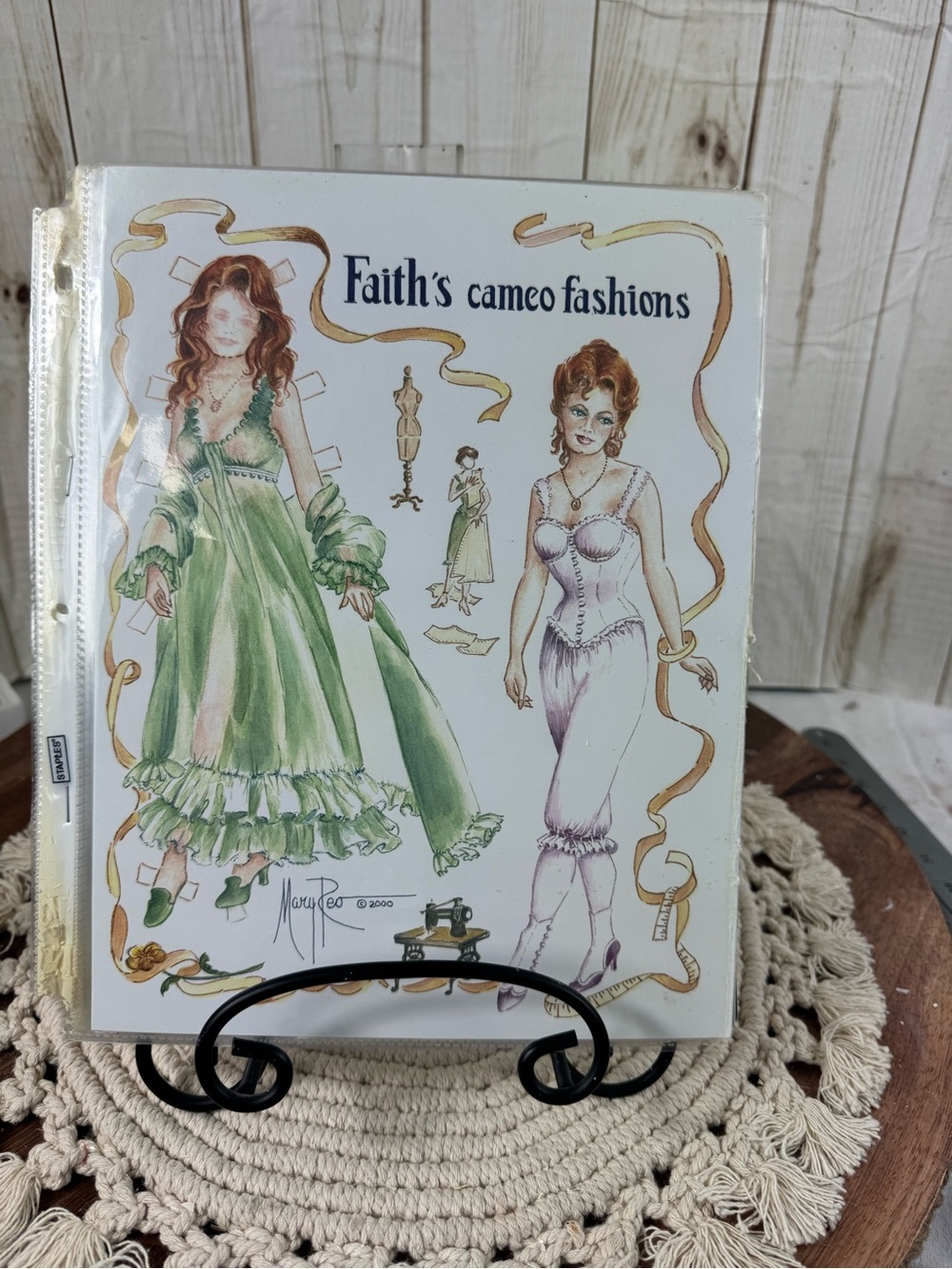 Faith's Cameo Fashions Paper Doll Set.Seven paper dolls with outfits.